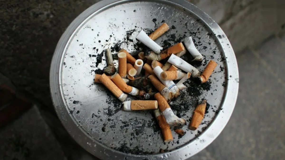 Doctor speaking about quitting smoking while audience listens
