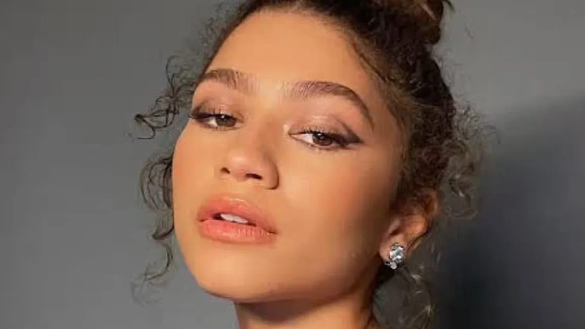 Zendaya smiling and looking confident
