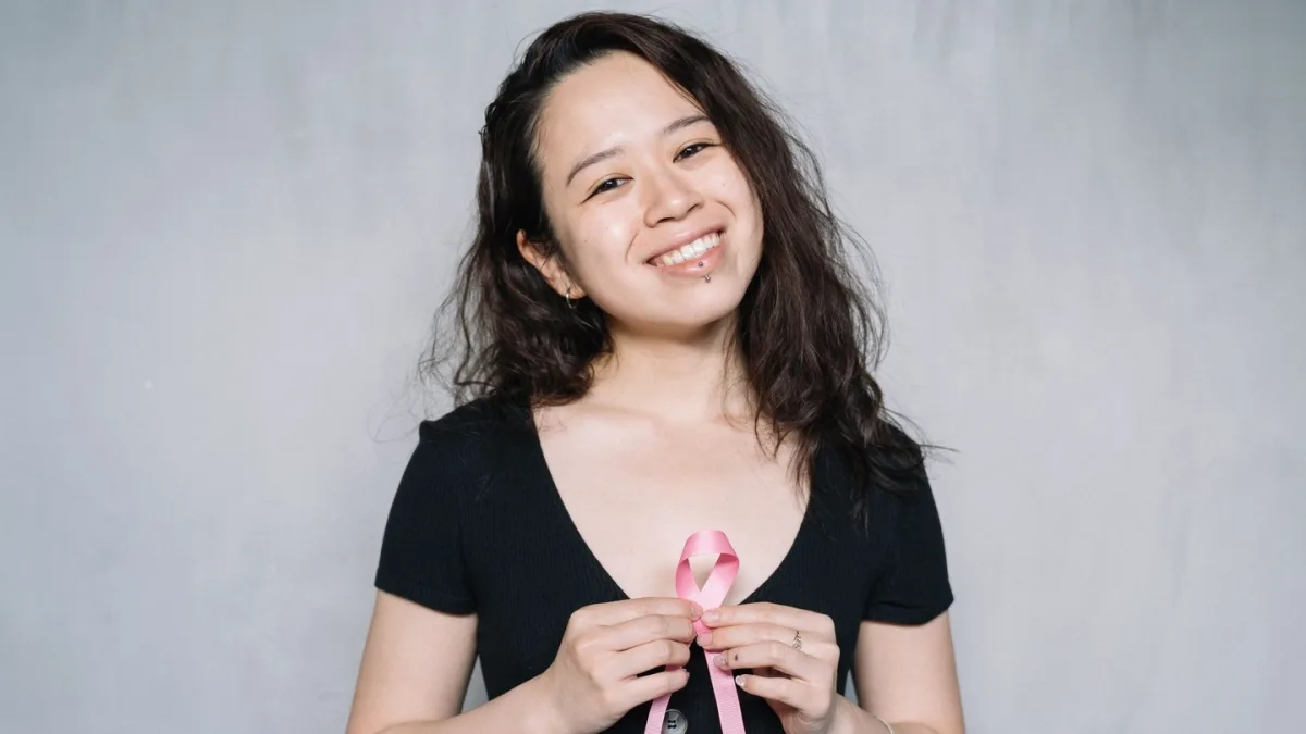 A woman wearing a comfortable bra and exercising to reduce breast cancer risk