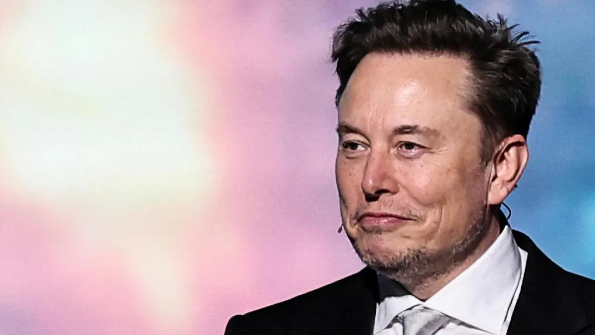 Elon Musk speaking at a conference