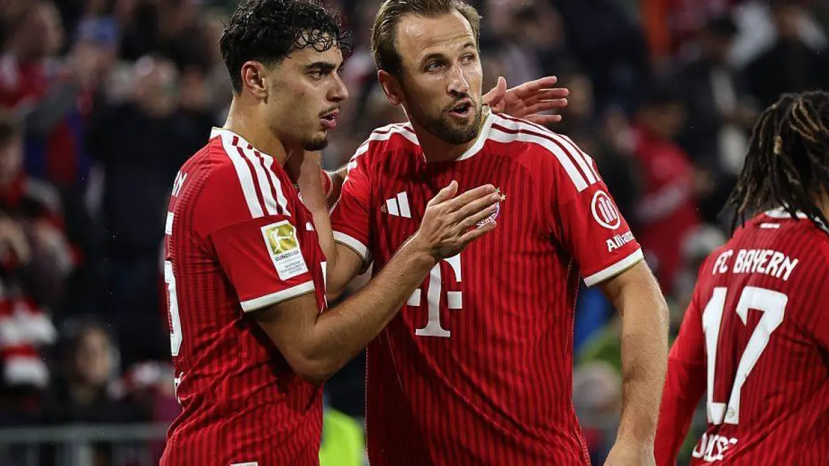 Harry Kane celebrating his goal in his 100th Bundesliga game