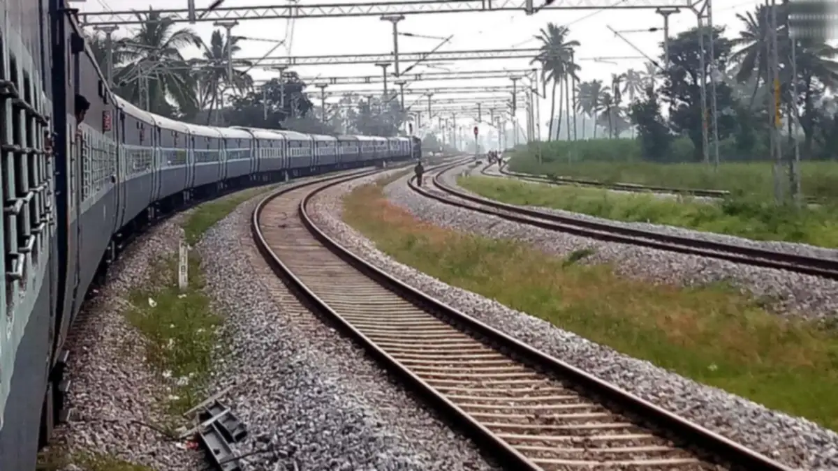A representation of a railway track with a body lying beside it