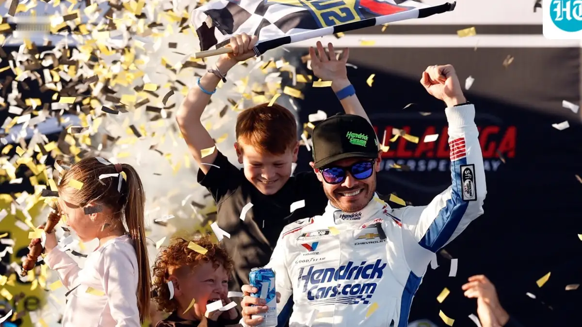 Kyle Larson celebrating his win at the YellaWood 500