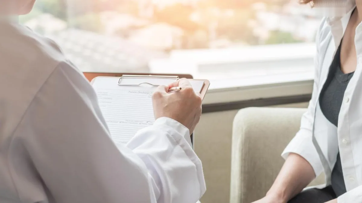 A woman consulting with a doctor about menopause symptoms