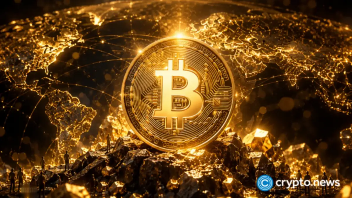 Michael Saylor, CEO of Strategy, holding a Bitcoin