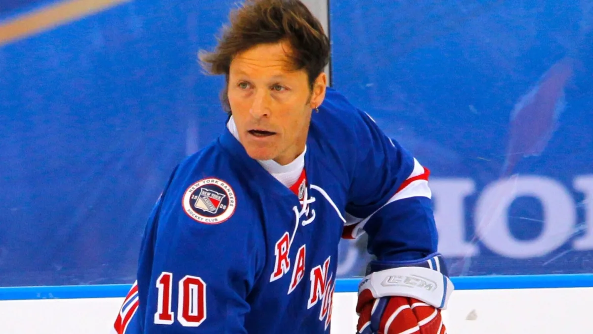 Ron Duguay on the ice, smiling