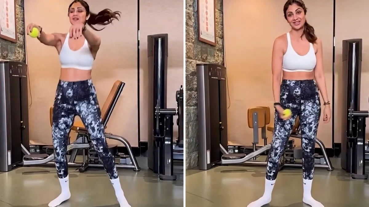 A person holding a ball and exercising