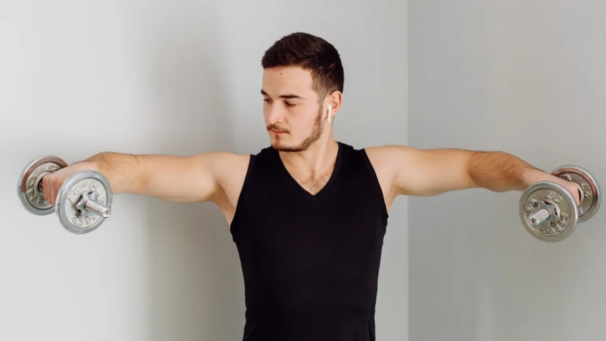 A person doing shoulder exercises with proper form