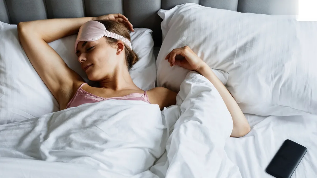 A person sleeping on a supportive mattress with a suitable pillow