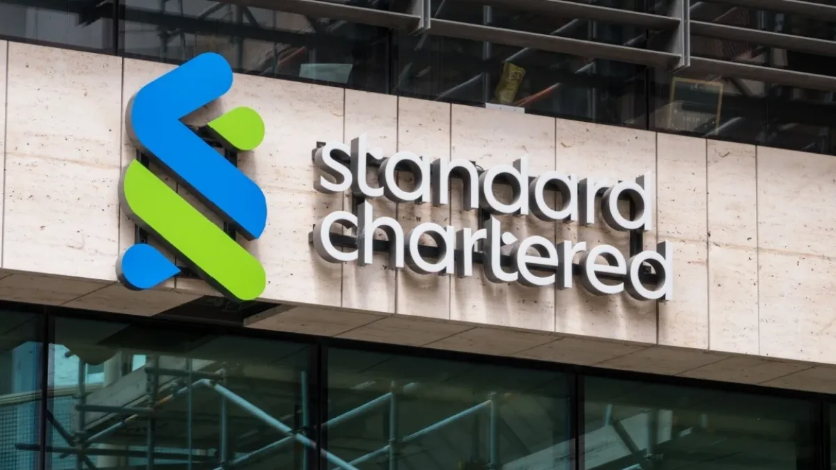 Standard Chartered logo with a bitcoin symbol