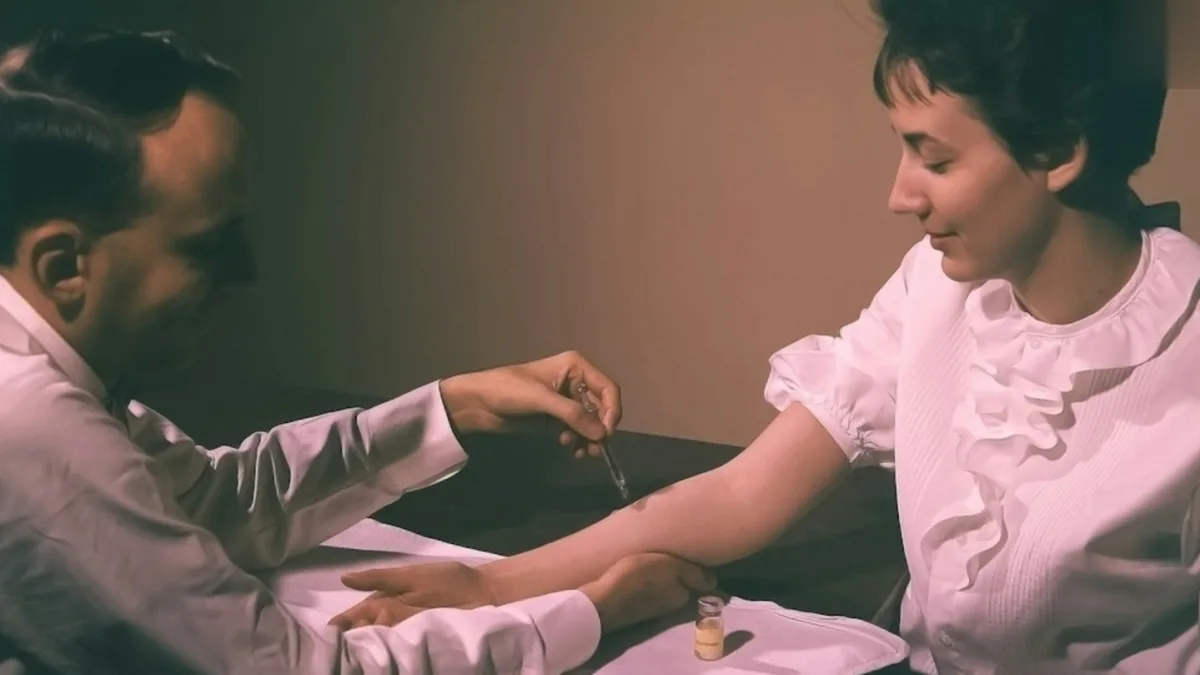 A doctor examining a patient with tuberculosis symptoms