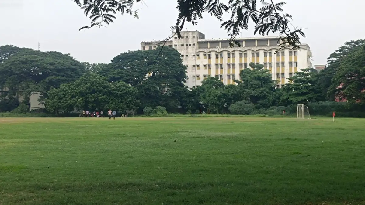 University of Madras campus with students playing sports